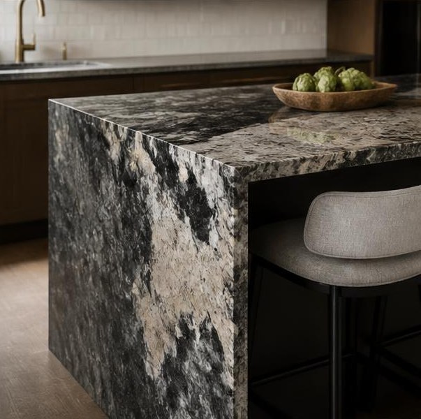 Dramatic natural granite waterfall kitchen island